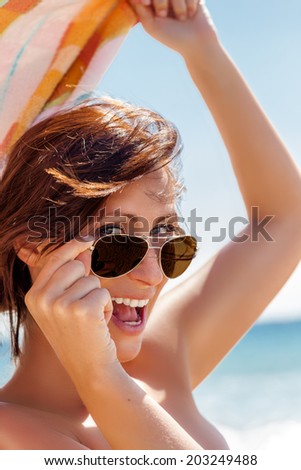 carefree summer female travel on beach