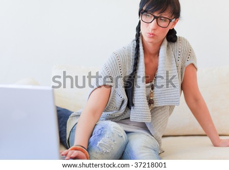 Indoor surfing web woman at home