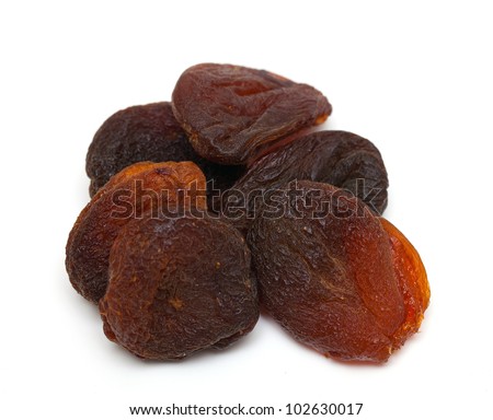 sun dried apricots isolated on white background