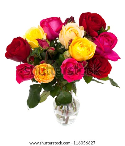 bunch of different roses in a glass vase isolated on white