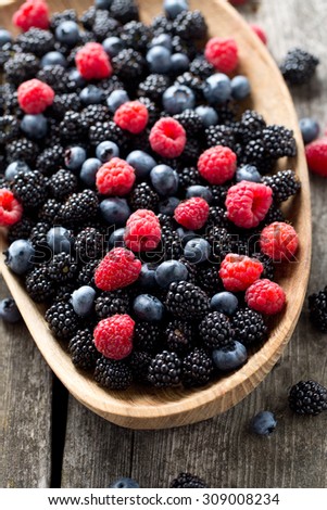 forest berries in a wooden bowl
