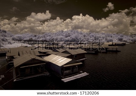Local Houses by the riverside , Thailand taken in Near Infrared