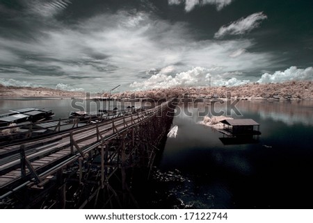 Wooden Bridge across the river ,  Thailand taken in Near Infrared