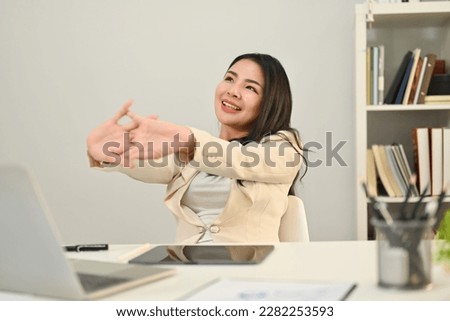 Similar – Image, Stock Photo Satisfied Asian resting female in casual wear having relaxation at tropical hotel