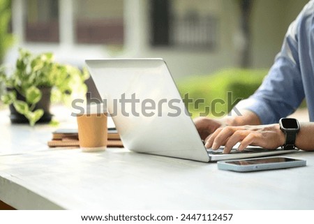 Similar – Image, Stock Photo Crop male entrepreneur browsing cellphone on street