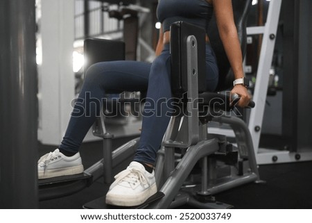 Similar – Image, Stock Photo Unrecognizable sportswoman exercising with elastic band at home