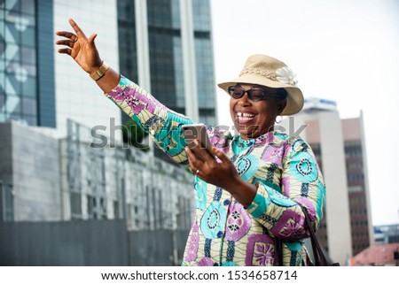 Similar – Image, Stock Photo Woman holding her hat wearing a bikini