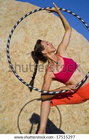 Hoop dancer performing in the California desert, on a summer afternoon.