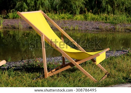 Folding chair in a Park to relax in the sun