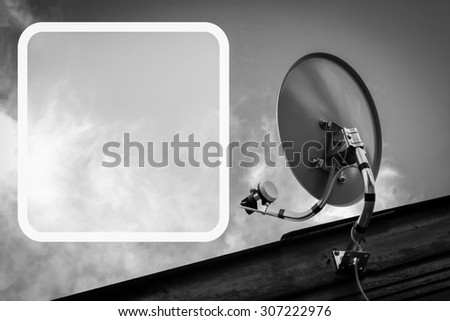 white frame on image of green satellite dish on the roof with blue sky background  ,black and white tone
