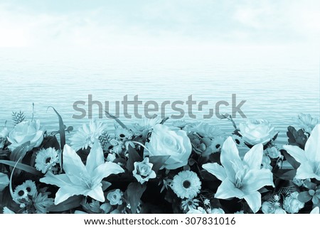 artificial florist on blur ocean background ,blue tone
