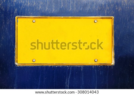 blank license plate on dirty metal plate background