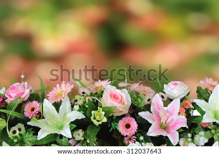 artificial florist with blur bokeh from bush background