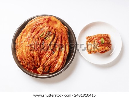 Image, Stock Photo Kimchi, fermented chinese cabbage in hot chili sauce , in bowl with chopsticks on rustic kitchen table. Close up