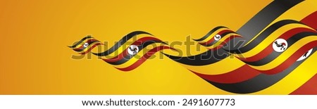 Uganda National Day waving flags two fold blue landscape background