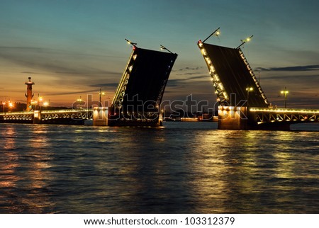 White nights. View of Neva river and raised Palace Bridge in St.Petersburg, Russia.