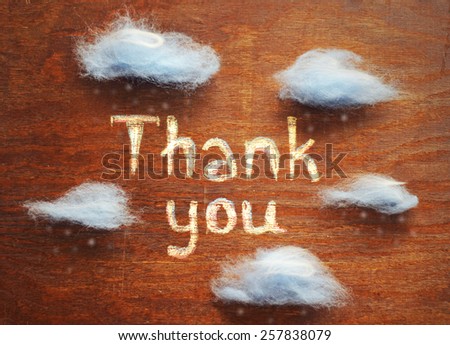 text thank you and clouds with snow, rain. thank you card.