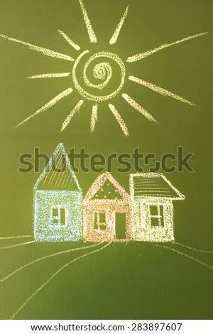 chalk drawn houses and sun