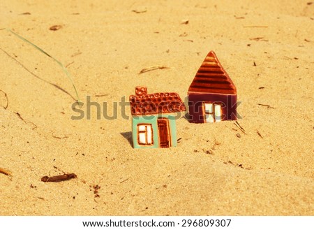 toy houses on beach