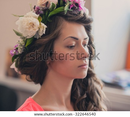 Beautiful Bride prepare to get wedding makeup. Wedding day
