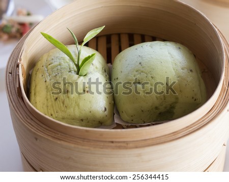 green steamed stuff bun