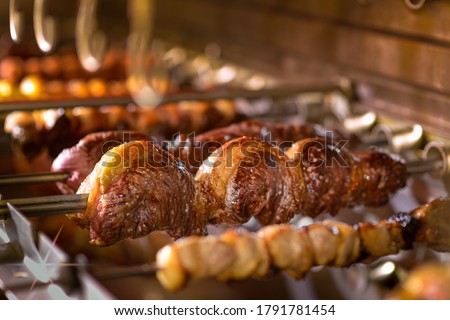 Picanha barbecue roasted over hot coals. This form of barbecue is widely consumed throughout Brazil.