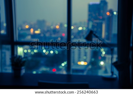 Abstract urban night light bokeh, defocused background, The city night view outside the window,