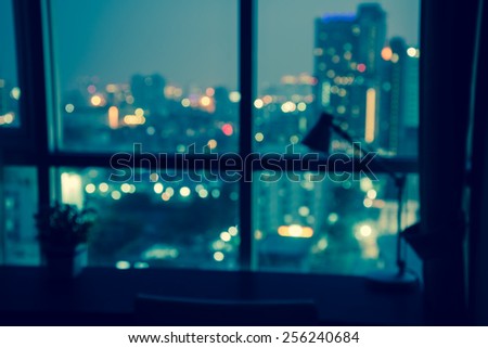 Abstract urban night light bokeh, defocused background, The city night view outside the window,