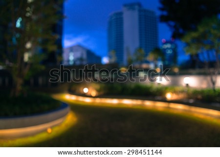 Abstract night garden light bokeh in twilight, defocused background