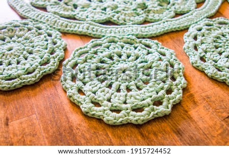 Similar – Image, Stock Photo knitting, gorgeous light green centerpiece