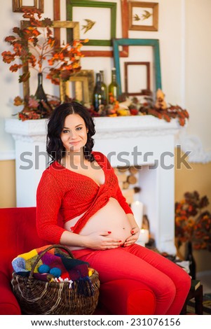 girl sitting by the fireplace
