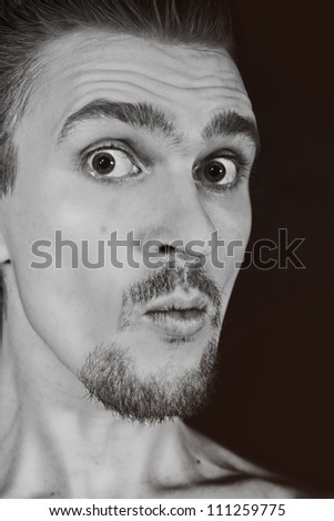 profile of man with funny face closeup