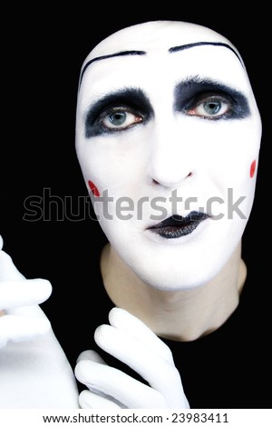 Portrait of  sad mime in white gloves MORE IMAGES FROM THIS SERIES IN MY PORTFOLIO