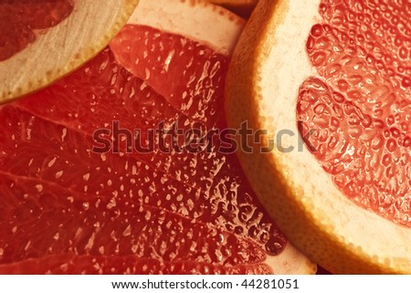 Parts of a  red grapefruit extreem close up