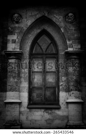 Beautiful window in the wall of a Gothic church