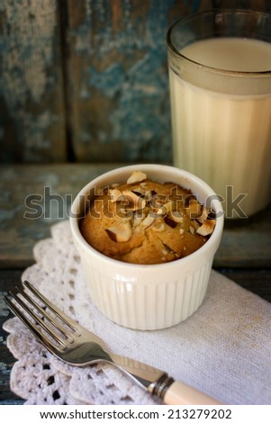 Tasty breakfast. Cake with nuts and milk. Your kids will be happy.