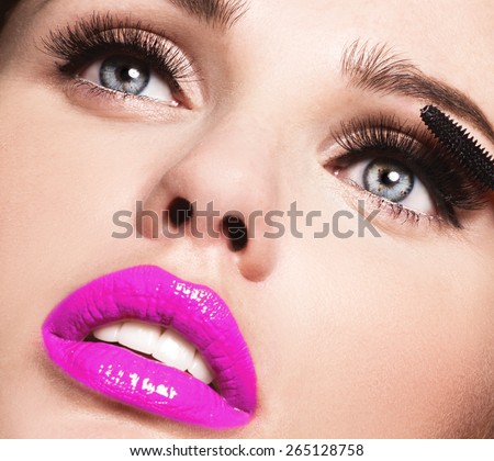 Mascara Applying. Long Lashes closeup. Mascara Brush. Eyelashes extensions. Makeup for Blue Eyes. Eye Make up Apply,pink lips
