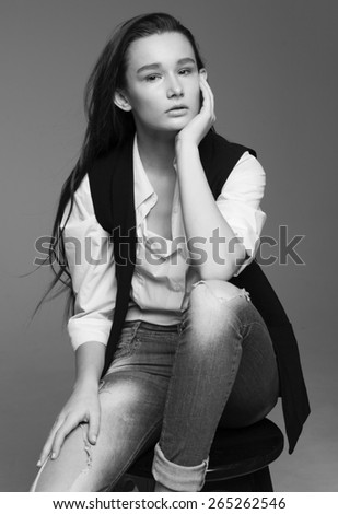 Young gorgeous model with a white shirt, black or white photo