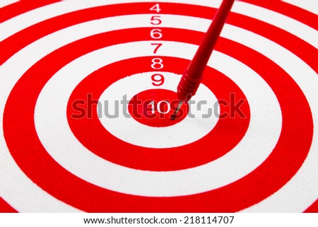 Numbers 10 Red dart target with red arrows  Close up