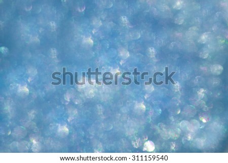 Blue glittery background. Blue glitter.