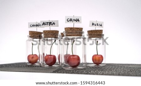 Chilean cherries inside glass containers 商業照片 © 