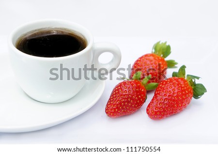 Sweet strawberries and cup of coffee, isolated on white background