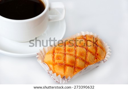 Bread with coffee isolated on white background