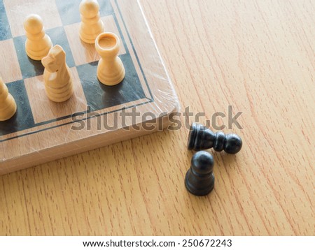 Black chess out of the board means the loser, Shallow in depth of field