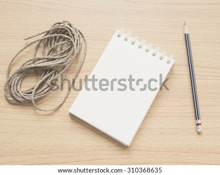 Paper note on wood dish with pencil and recycle rope, Concept for Handicraft or Handicraft creation, Filter process.