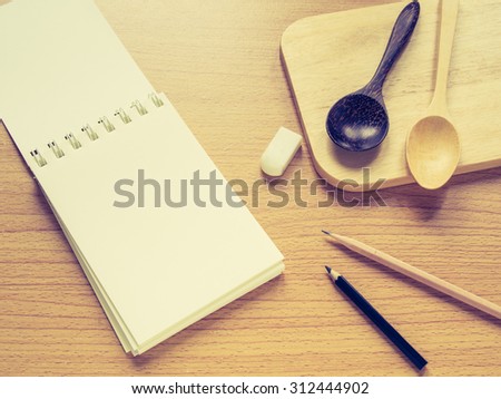 Paper note with wooden kitchen utensil, Concept for Menu Creation or Restaurant Commentator, Filter process.