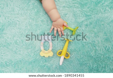 Similar – Image, Stock Photo Kid grabs his toy Child