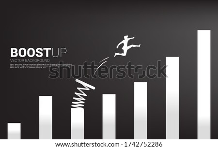 Silhouette of businessman jump to higher column of graph with springboard. Concept of boost and growth in business.