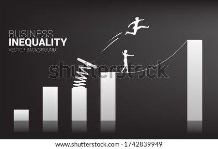Silhouette of businessman jump to higher column of graph with springboard over other on rope walk. Concept of boost and growth in business. Business inequality.