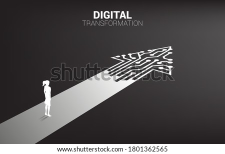 Silhouette of businesswoman standing on the way with dot connect line circuit. concept of digital transformation of business.